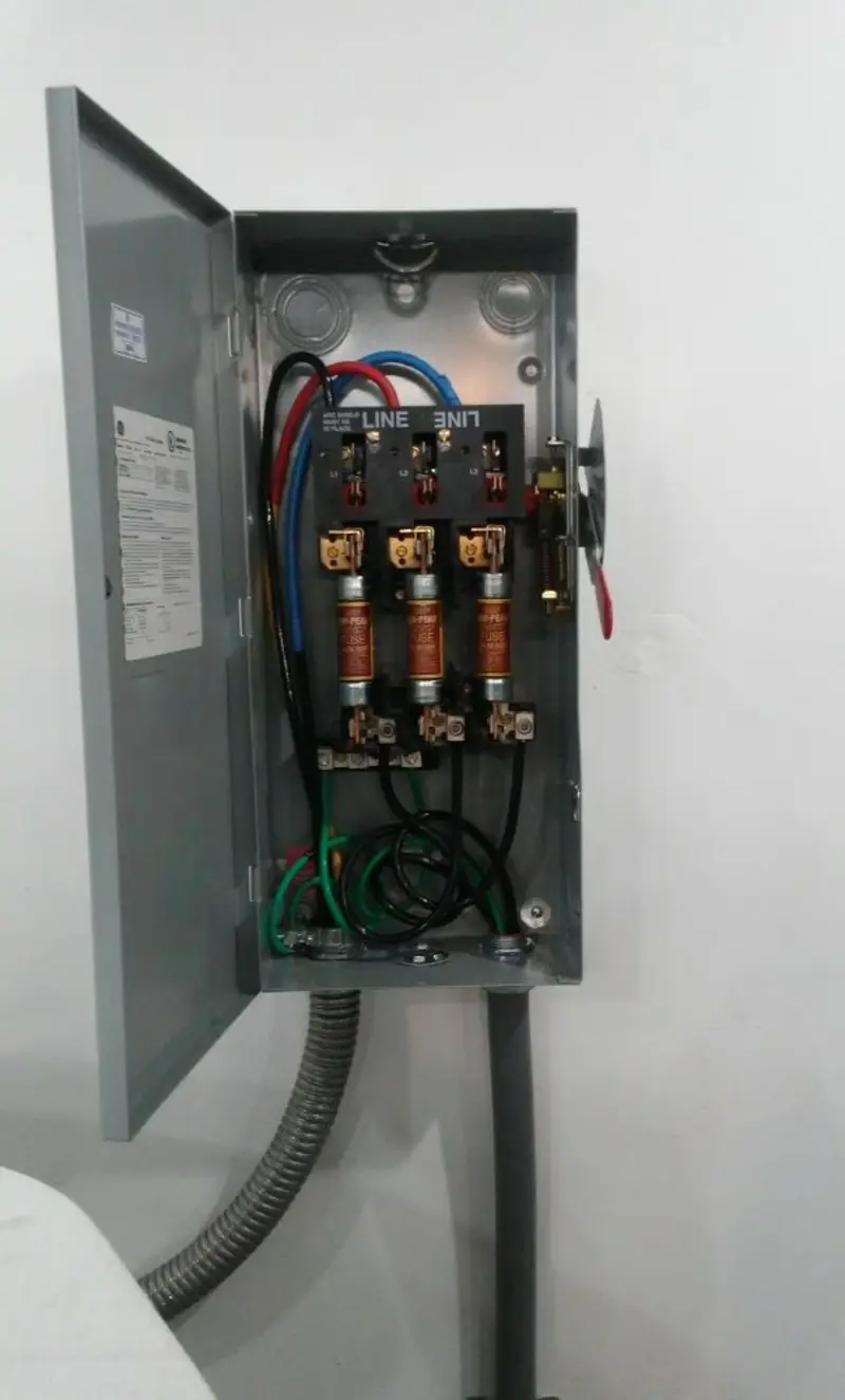 Three-phase disconnect switch installed for Smoke Detector Installation in Fountainebleau